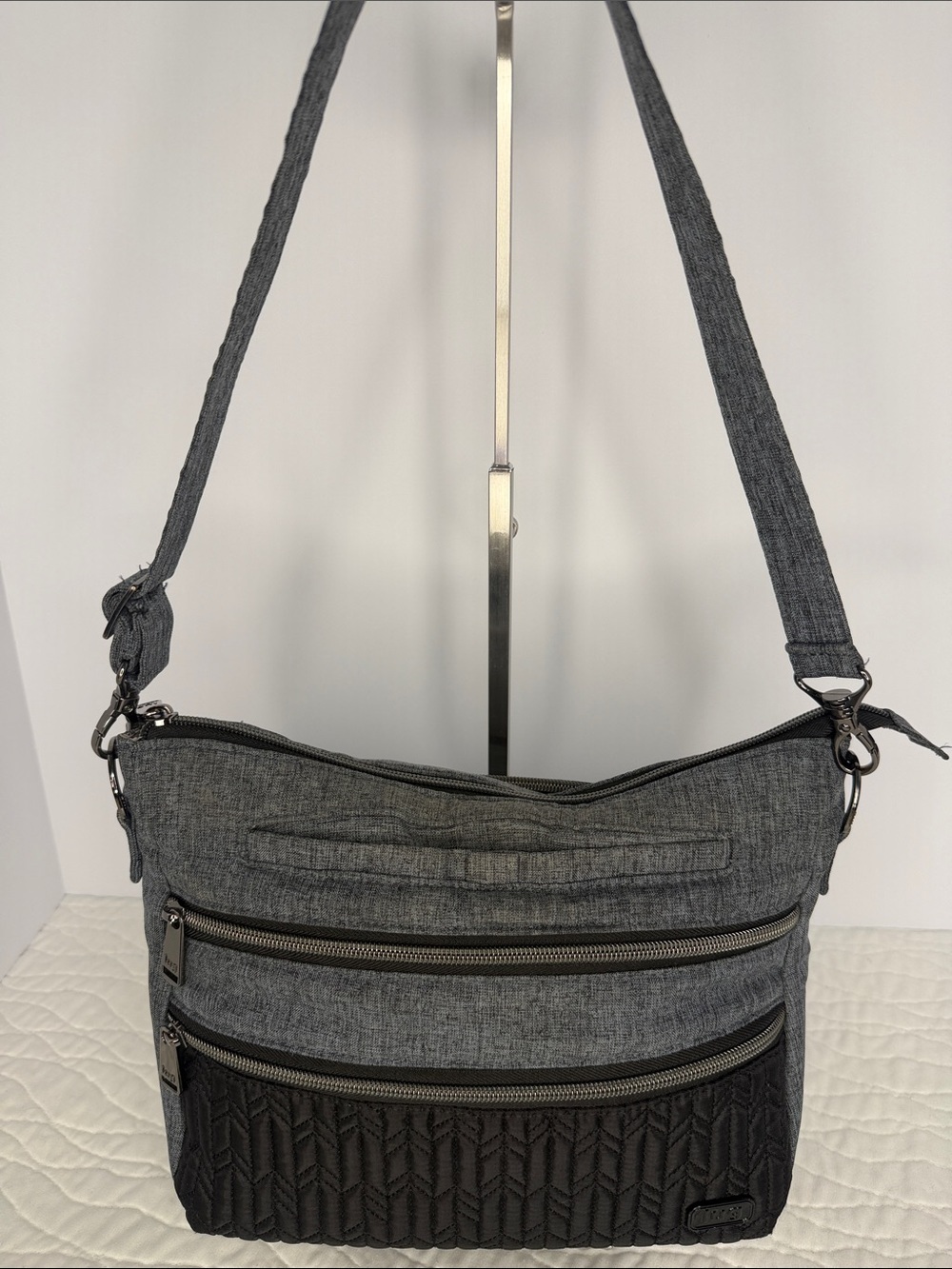 LUG Gray Quilted Accent Crossbody Bag with Multiple Zips and Straps